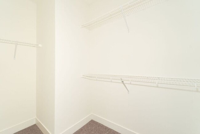 Building Photo - Like New Townhome With Your Own Rooftop Views of Downtown Indy!