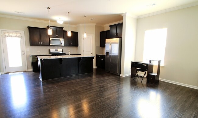 Building Photo - 3/2.5 House with Fenced-In yard and GORGEOUS interior!