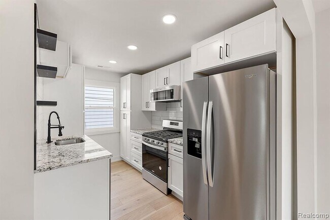 Building Photo - 308-310 East Harry Ave