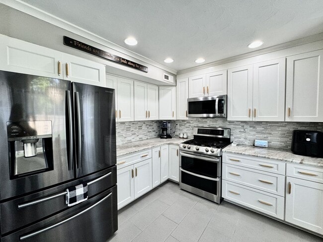 Building Photo - Available 07-01-26! 2-Car Attached Garage - Pet Friendly w/Restrictions - Fenced Yard on a HUGE C...