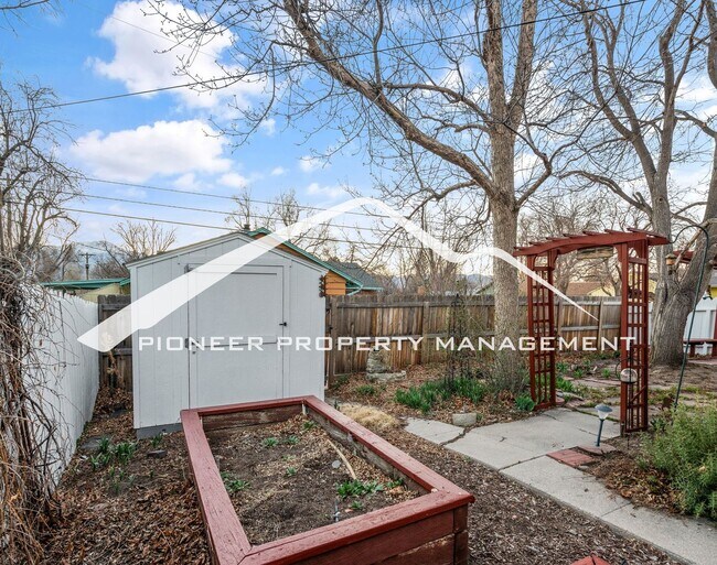 Building Photo - Beautifully Renovated Ranch Home with 2 Car Garage, AC, Garden Space & Prime Location