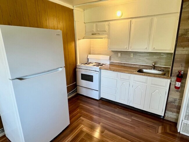 Building Photo - Freshly Renovated Studio Apt. With All Uti...