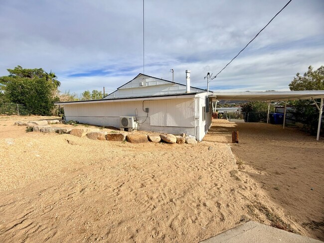 Building Photo - Modern 3-Bedroom Desert Bungalow with Stunning Views – Unfurnished - Price reflects MOVE IN SPECI...