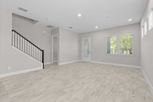Building Photo - Move In Ready End Unit Townhome in Laureate Park | 3 Bed | Tesla Charger