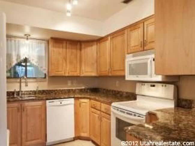 Building Photo - Prime Amenities Await: Newly Renovated 2-B...
