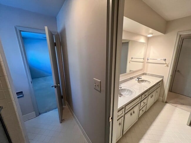 Building Photo - Step into this inviting, sunlit home where space and comfort blend seamlessly