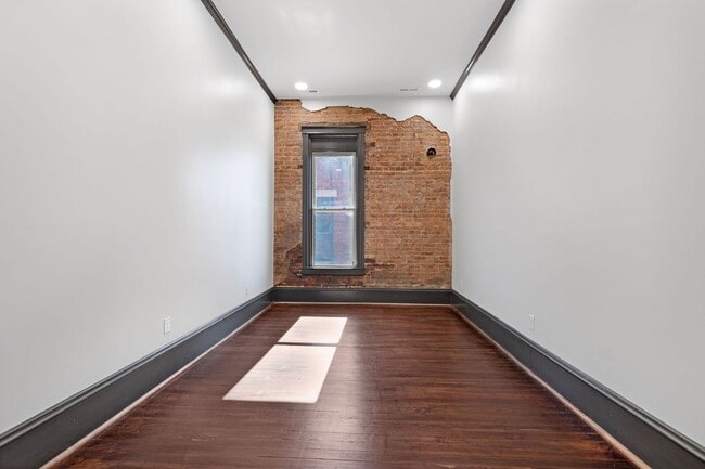 Building Photo - Historic Charm Meets Modern Luxury