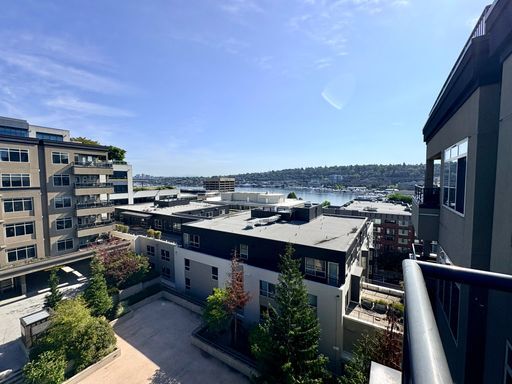 Building Photo - Top-Floor Corner 2BR with Lake Union Views + Garage Parking Included!