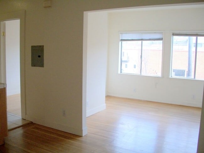 Building Photo - A Bright Sunny 1 bedroom, with Hardwood Floors