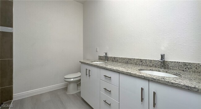 Building Photo - 9008 Justice Cir