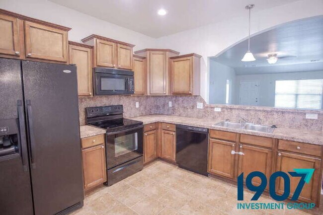 Building Photo - Sacious 4-Bedroom Home with Open Layout!