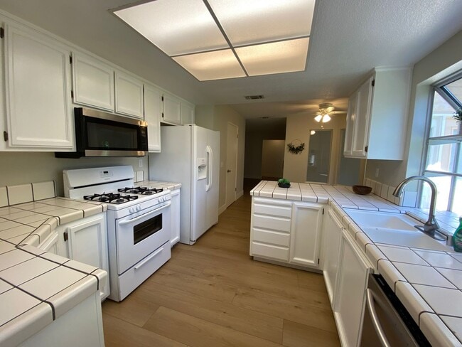 Building Photo - Gorgeous Home With Multiple Living Rooms, Two Primary Suites, Fruit Trees, And More!