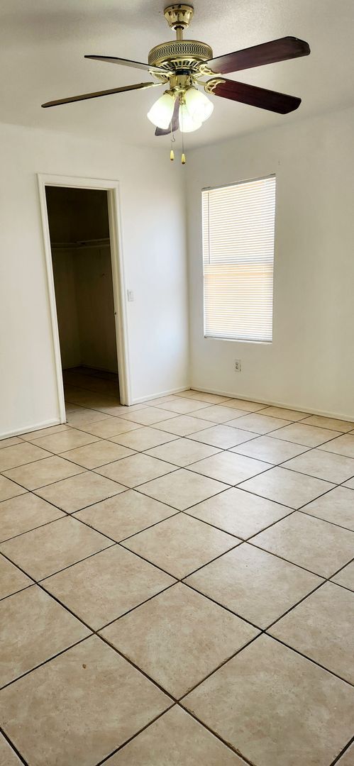 Building Photo - Large 4 Bedroom- A/C- All Ceramic Tile- Wo...