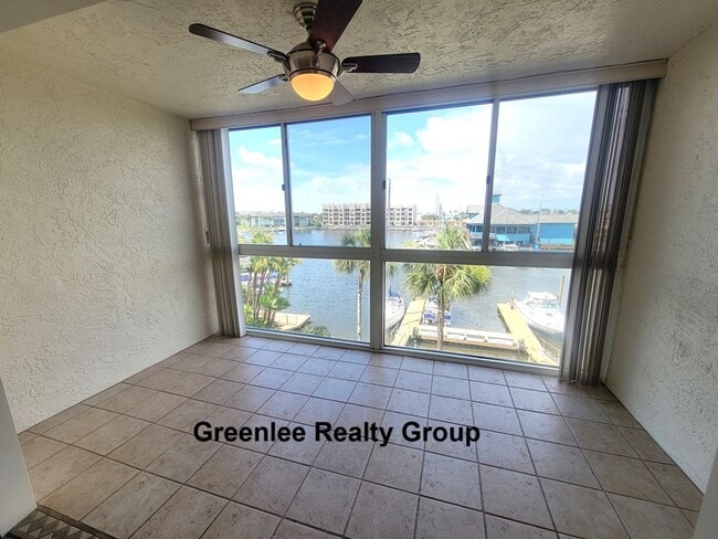 Building Photo - Waterfront Living & Maintenance Free Living at Its Finest – With Views You’ll Never Get Tired Of!