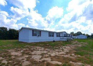 Building Photo - Spacious 4 bedroom with 3 FULL bathrooms nestled on 2 acres! MUST SEE!!!