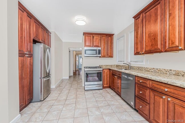 Building Photo - 5630 Riverdale Ave