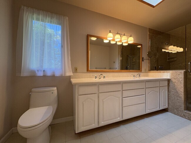 Building Photo - Beautiful Serene 4-Bedroom Home on a Gated...