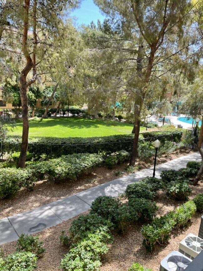 Building Photo - Meridian STUDIO Condo Fully Furnished near Main Pool-Lush Green trees in Resort Style Community.