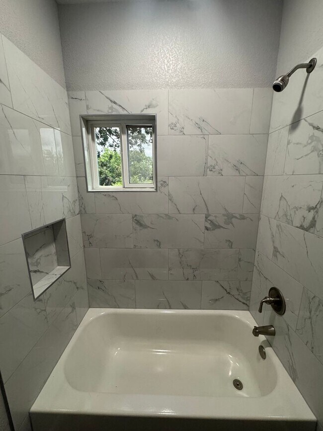 Building Photo - 3/2/2 NEW CONSTRUCTION Spacious YARD WITH ...