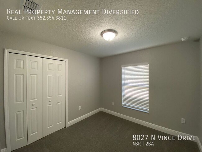 Building Photo - 8027 N Vince Dr