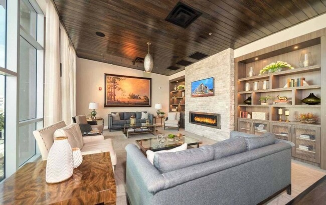 Curl up and unwind in the cozy lounge area, the perfect spot to relax and recharge. - Windsor Central Arts