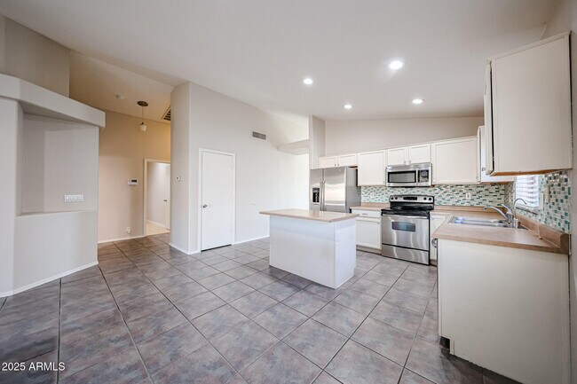 Building Photo - 8672 W Mauro Ln