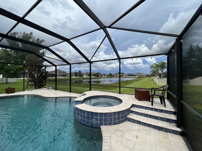 Building Photo - "Spacious 4-Bedroom Lutz Home with Elegant...