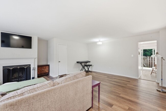 Building Photo - This beautifully refreshed condominium offers a refined blend of style and comfort