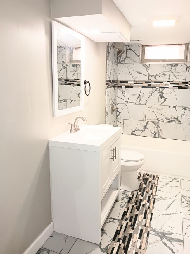 Building Photo - Beautifully Renovated, Modern 3 bedroom 2....