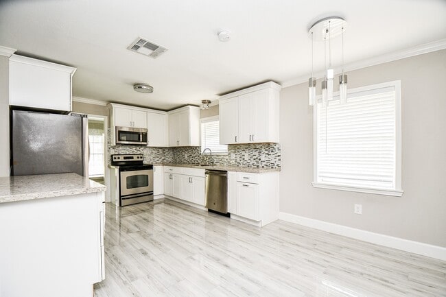 Building Photo - 4310 Woodvalley Dr