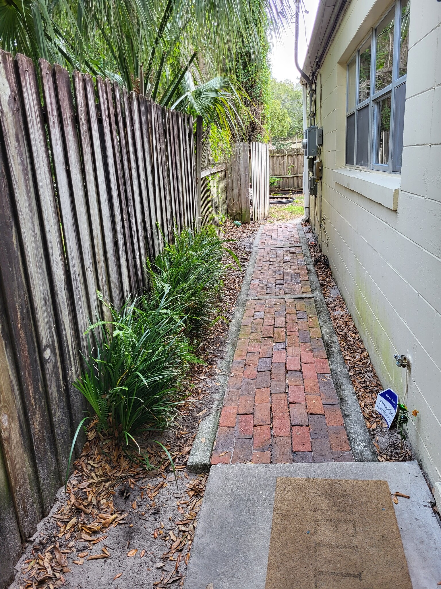 Brick Pathway to backyard - 1210 E Jackson St