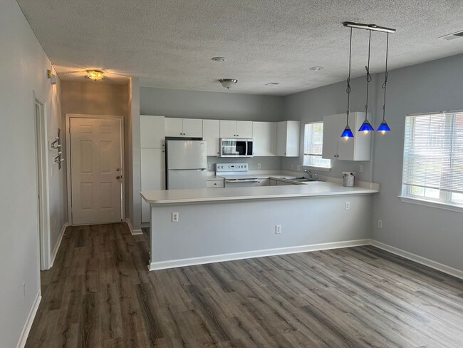 Building Photo - First Floor, End Unit, Two bedroom, Two ba...