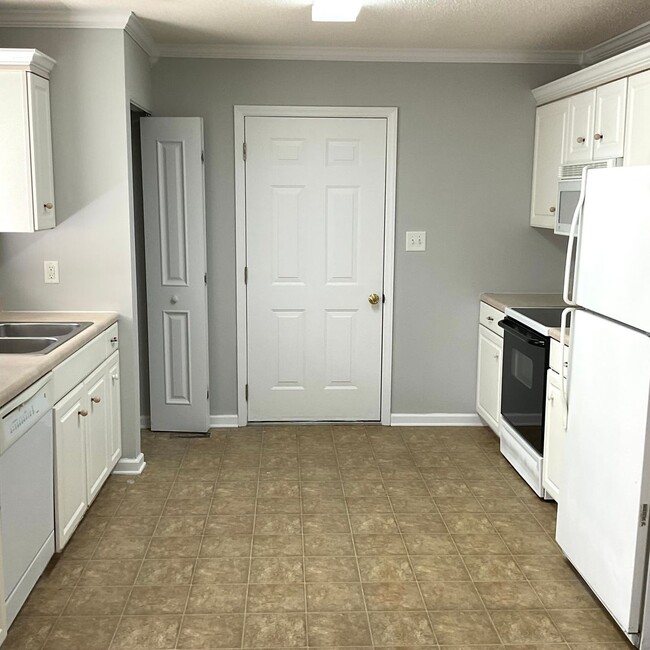 Building Photo - Home with 3 Bedrooms, 2 Baths with 2 Car G...