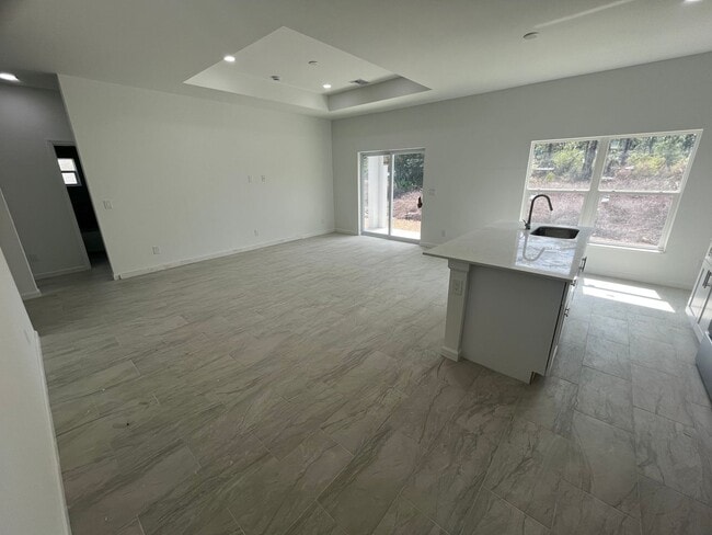 Building Photo - MODERN BRAND NEW 4BD/2BA RETREAT IN LEHIGH ACRES!