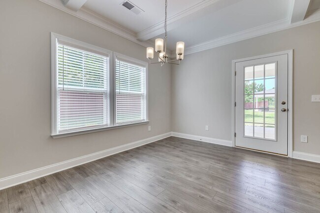 Building Photo - Beautifully maintained 4 / 2.5 home in Joh...