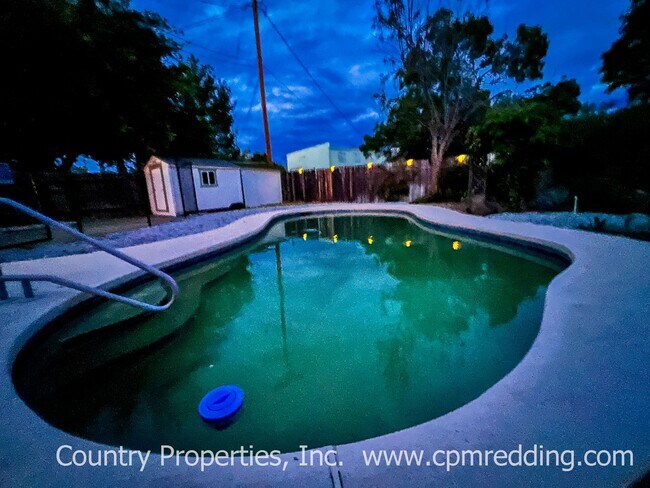 Building Photo - Spacious 3-Bedroom House with Gated Pool i...