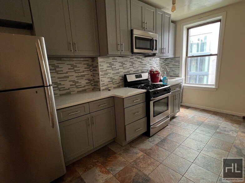 Building Photo - 4BR 1BA Turn Of The Century Floor Through Fulton St. Shophouse Brownstone w/ Bonus Room