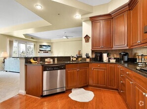 Building Photo - "Spacious 2-Bedroom Condo with Elegant Har...