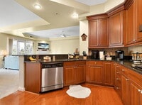 Building Photo - "Spacious 2-Bedroom Condo with Elegant Har...