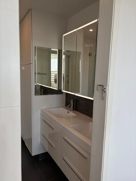 Dual vanity with power and heated medicine cabinet - 8530 Holloway Dr