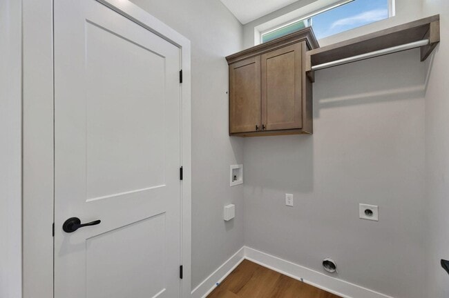 Building Photo - Modern 3-Bed Ranch in Maize – Zero-Entry L...