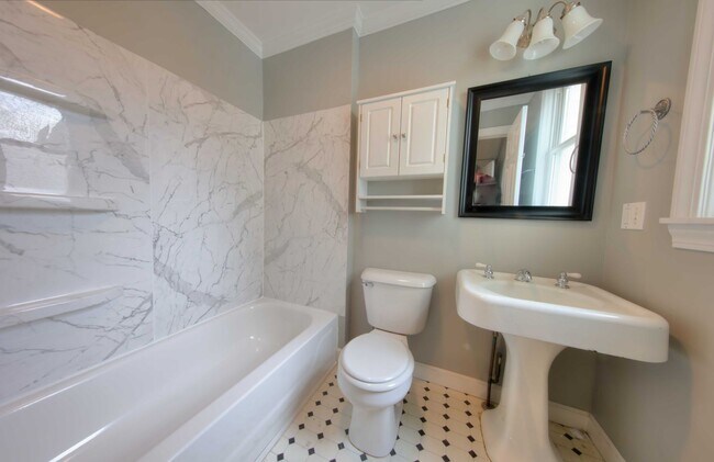 Building Photo - This classic 3 bedroom 2 bath Webster home features a front porch, large deck off the kitchen for...