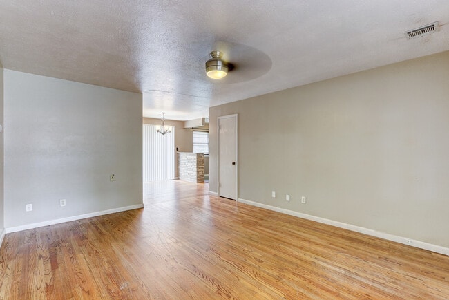 Building Photo - Spacious 3-Bedroom Home with a Fenced Yard and Easy Access to Everything!