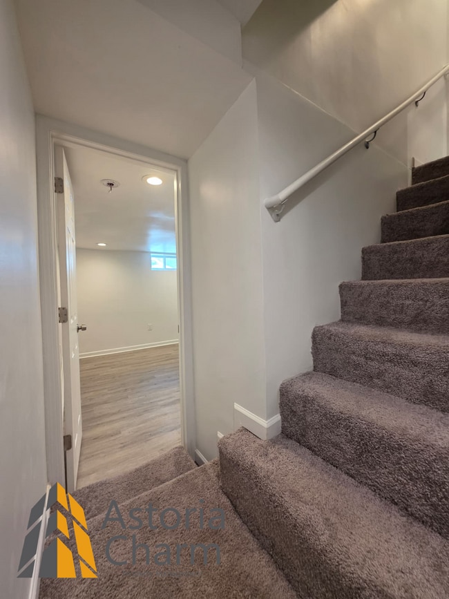 Building Photo - 3 Bedroom End Unit with Finished Basement and Fenced Yard on E 28th Street