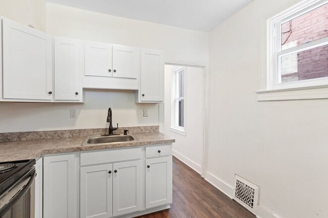 Building Photo - Coming Soon! Spacious 4 Bedroom, 1.5  Bath...