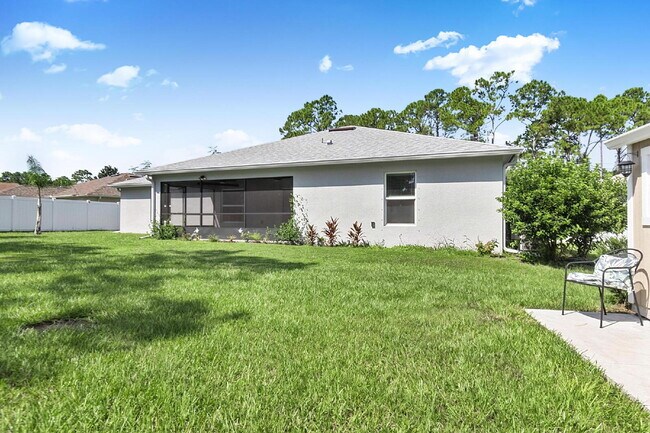 Building Photo - Modern 4-Bedroom, 3-Bath Home with Private In-Law Suite – Palm Coast, FL