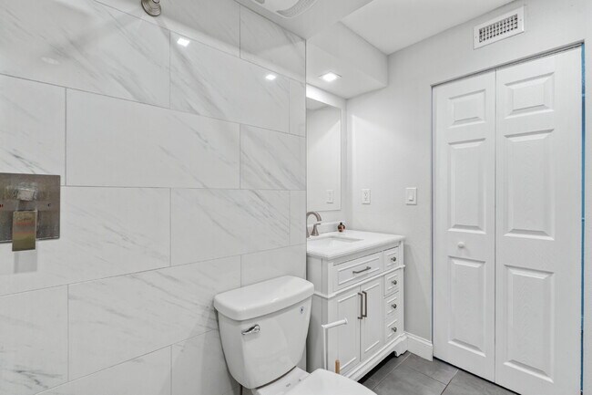 Building Photo - NEWLY RENOVATED TWO BEDROOM CONDO IN WATERFRONT RESORT STYLE COMMUNITY