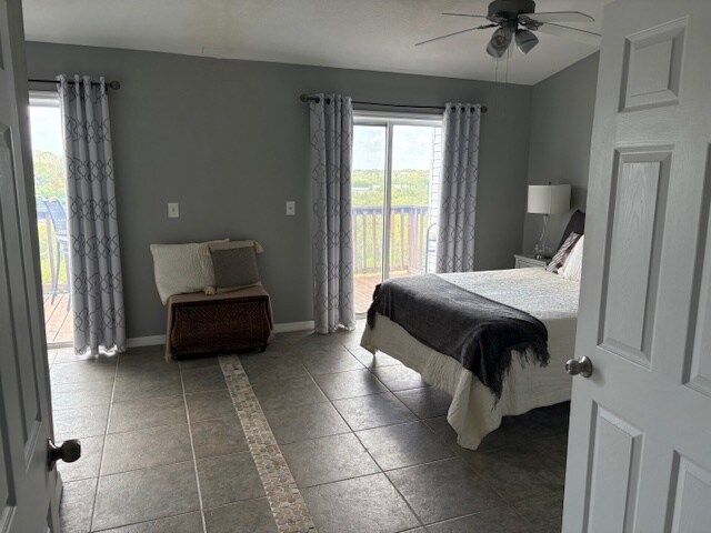 Primary Bedroom with sliding doors to private deck - 574 Ryans Woods Ln