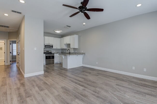 Building Photo - Stunning 3 Story Town-Home near Texas Tech...