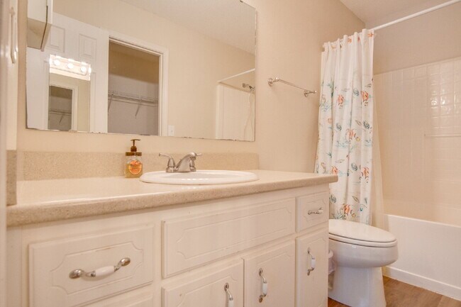 Building Photo - Northeast Pensacola 2 R, 2BA Home Near UWF with Wood-Look Flooring, Large Sunroom, Spacious Lot &...